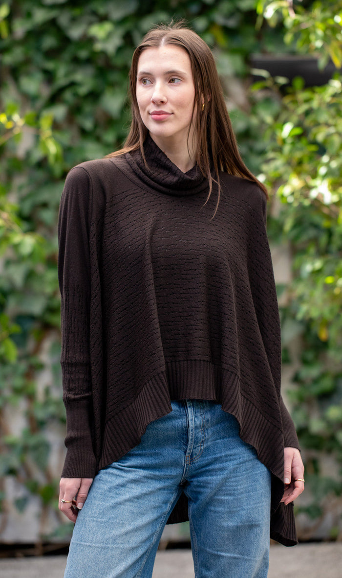 Woman wearing Country Laine - The Nest Top (CL0130-IND2026) in the colour Chocolate.
