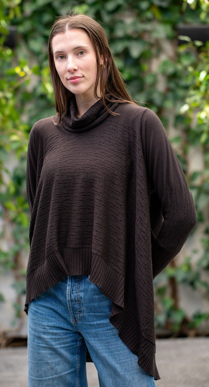 Woman wearing Country Laine - The Nest Top (CL0130-IND2026) in the colour Chocolate.
